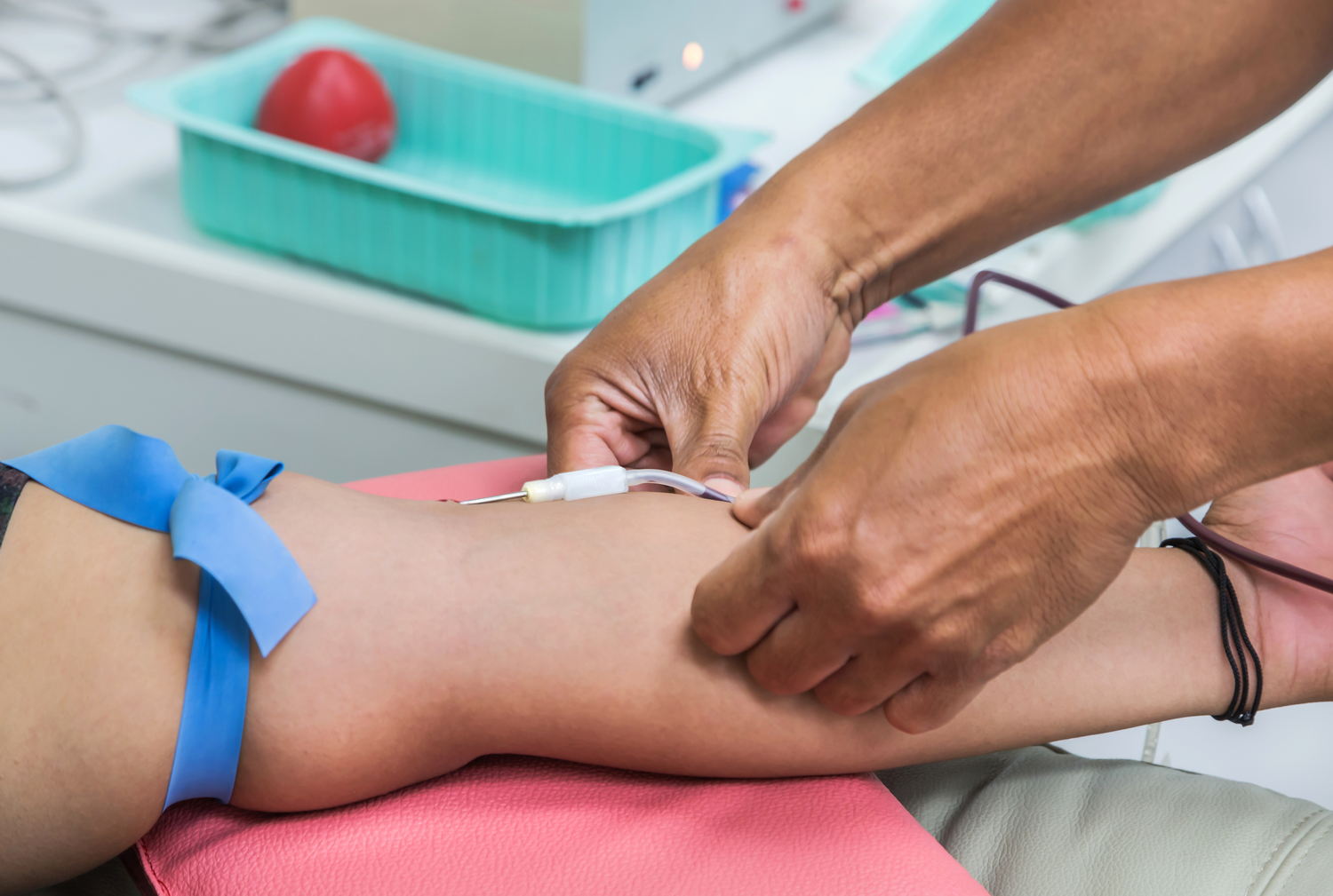 blood donor during the transfusion at laboratory with the needle blood donor during the transfusion at laboratory with the needle